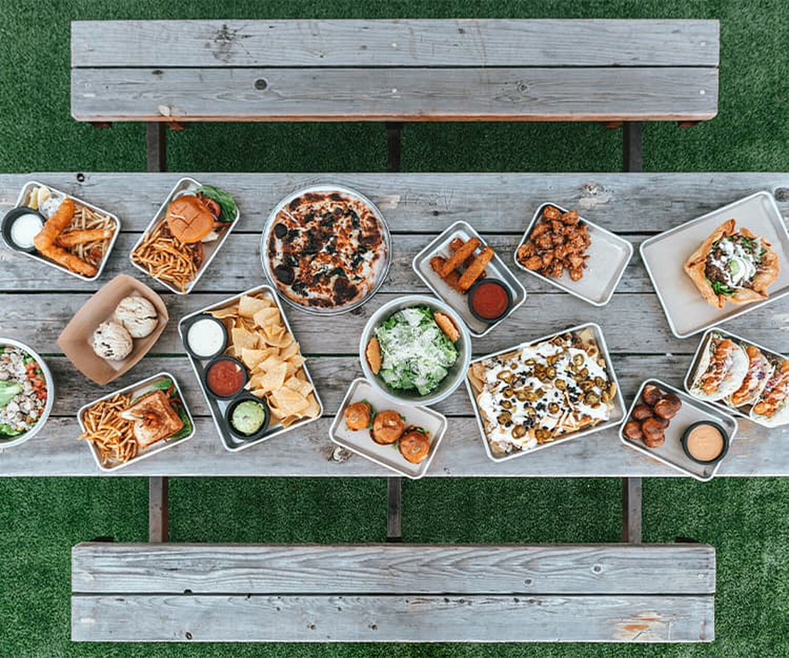 Snacks and drinks on a picnic table